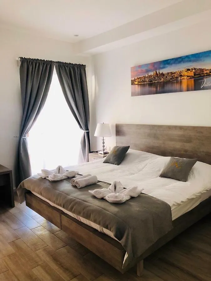 Гостевой дом Napoli Suites Сент Джулианс