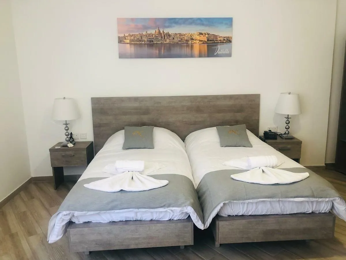 Гостевой дом Napoli Suites Сент Джулианс